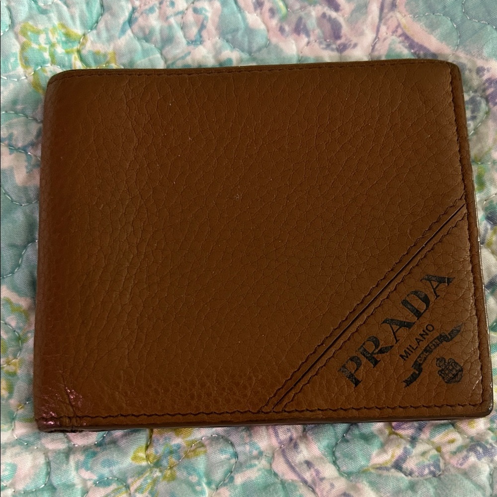Prada men’s textured Leather Bifold wallet